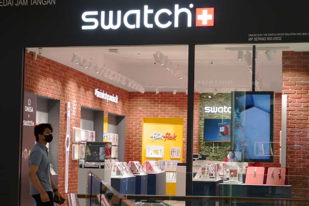 Malaysian authorities raided Swatch stores and confiscated more than 160 watches in May (AP Photo/Vincent Thian)
