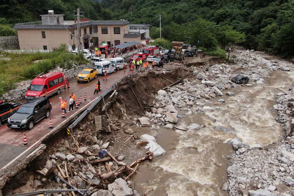 The aftermath of a mudslide in the Weiziping village of Luanzhen (Zou Jingyi/Xinhua via AP)
