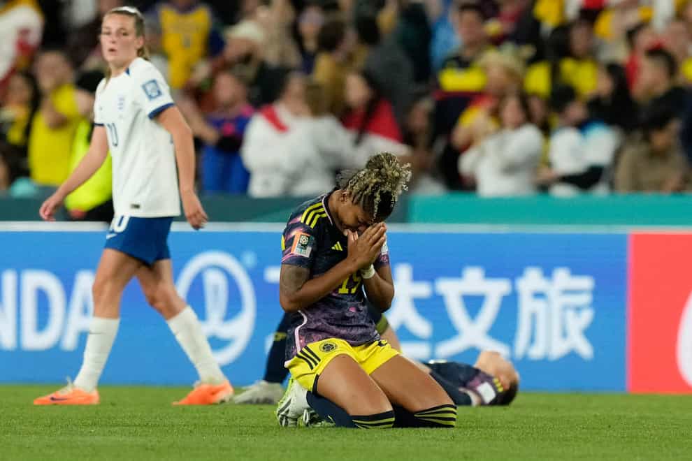 Colombia’s Jorelyn Carabali, shown on her knees after losing the Women’s World Cup quarter final against England, is mourning her brother after he was shot dead (AP Photo/Mark Baker)