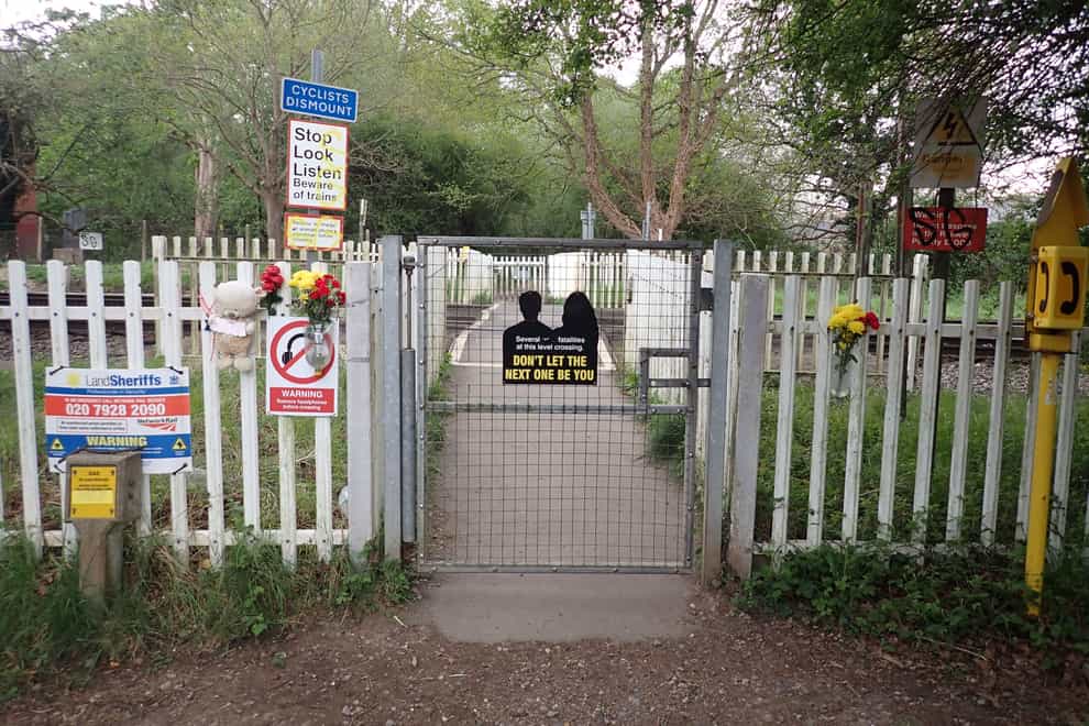 An investigation into the death of an elderly woman who was struck by a train at a level crossing has been reopened (RAIB/PA)