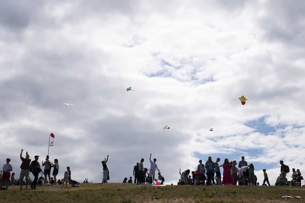 People fly their kites on Hampstead Heath (Kirsty O’Connor/PA)