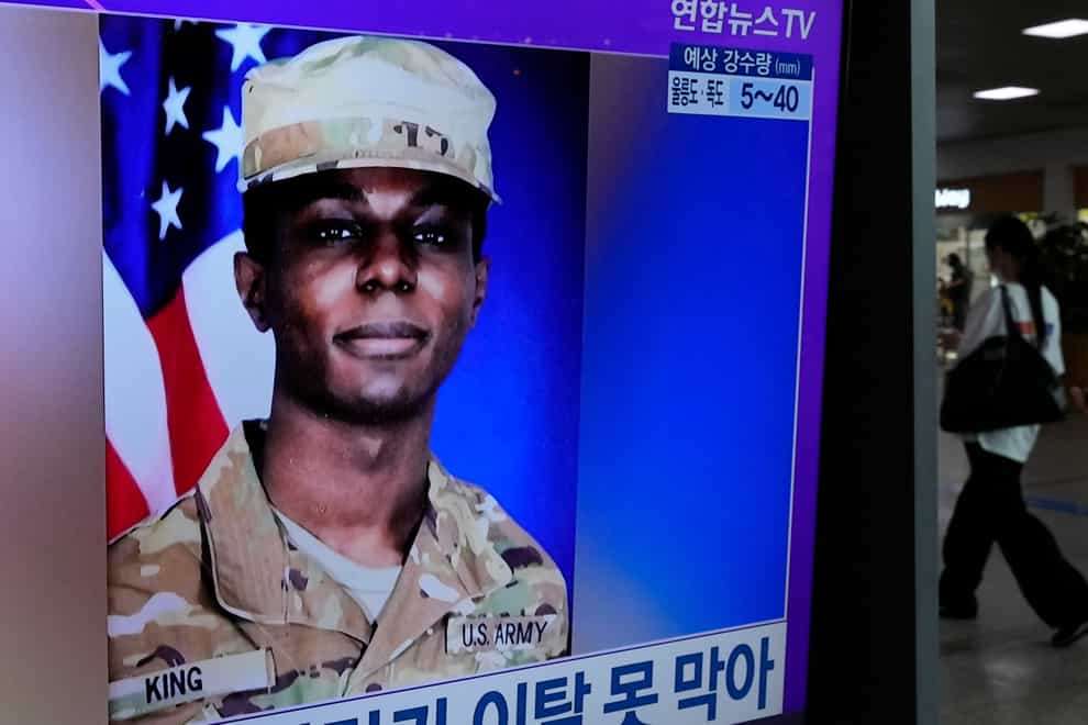 A TV screen shows American soldier Travis King (Ahn Young-joon/AP)