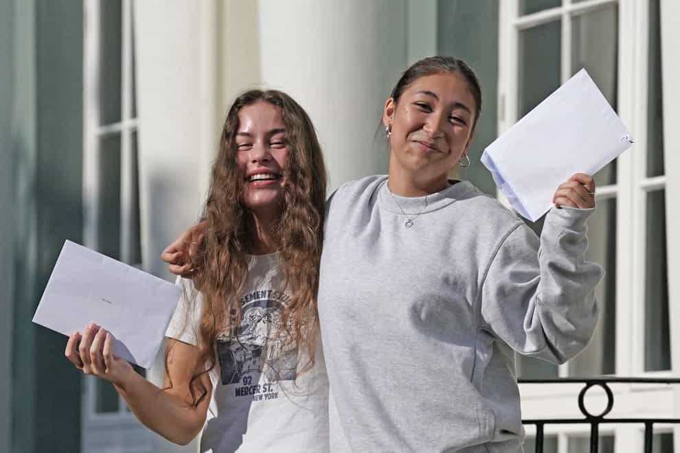 Mary Watts (left) and Tallulah Huggins receive their A-level results at Brighton Girls School (Gareth Fuller/PA)