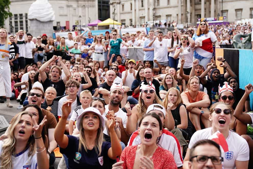 Fans in Trafalgar Square watching a screening of the Uefa Women’s Euro 2022 final (Aaron Chown/PA)