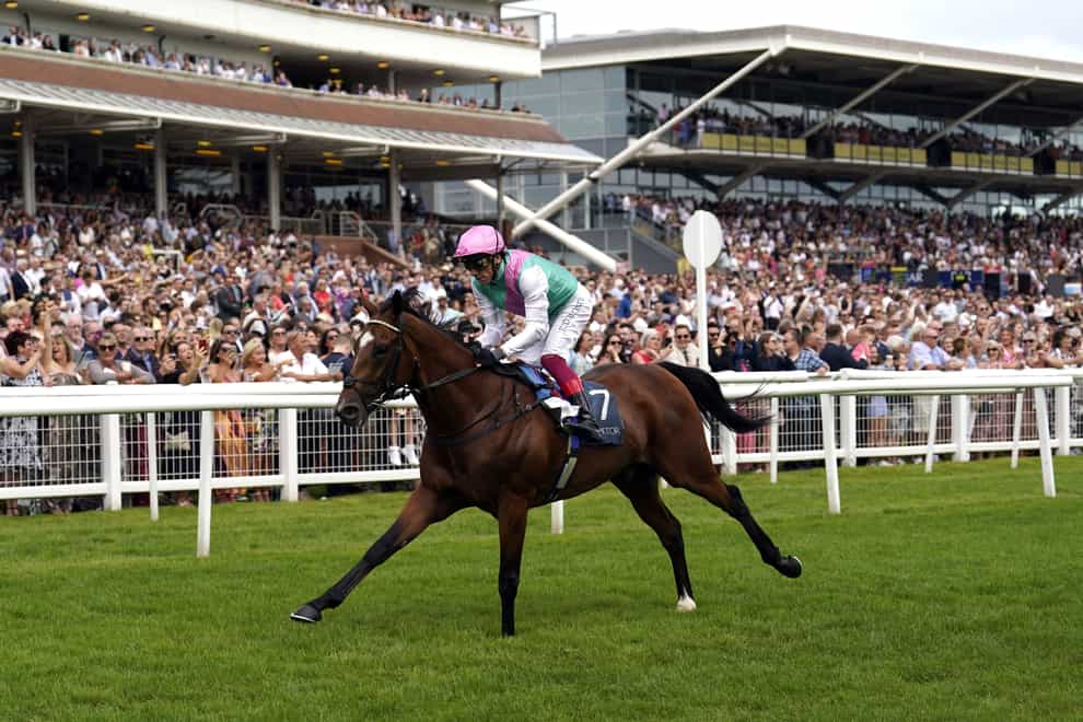 Arrest ridden by Frankie Dettori on their way to winning the BetVictor Geoffrey Freer Stakes at Newbury Racecourse. Picture date: Saturday August 19, 2023.