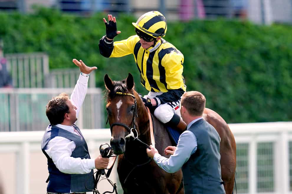David Egan celebrates on board Eldar Eldarov after winning The Queen’s Vase in a photo finish during day two of Royal Ascot at Ascot Racecourse. Picture date: Wednesday June 15, 2022.