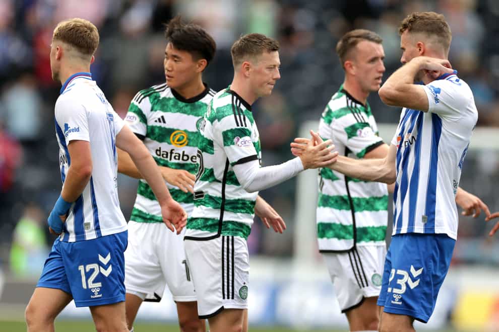 Celtic’s Callum McGregor shake hands with Kilmarnock’s goal hero Marley Watkins (right) after the final whistle (Steve Welsh/PA)