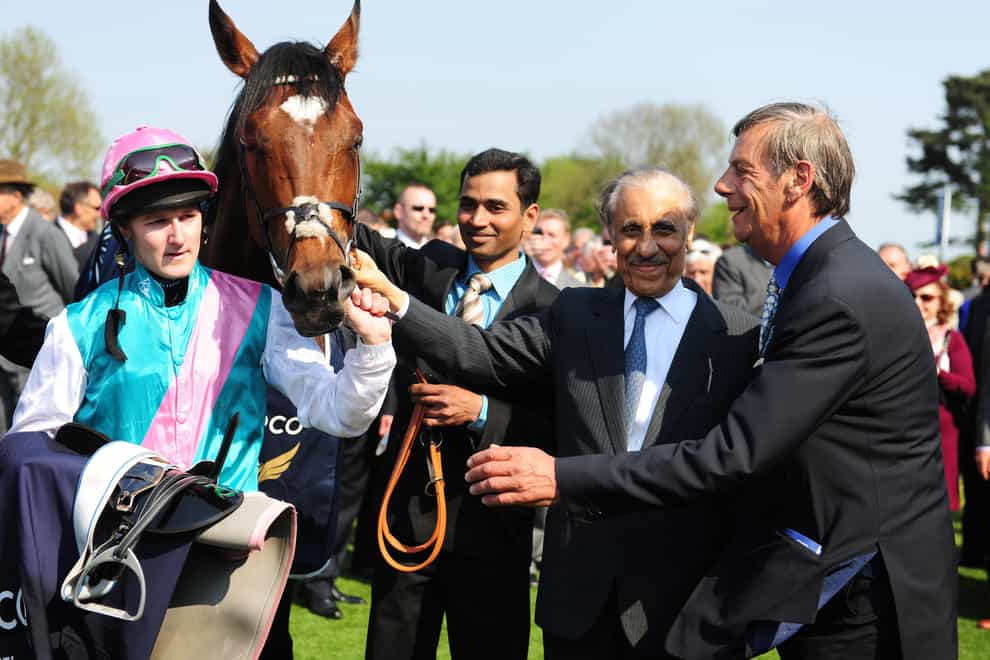 Jockey Tom Queally with horse Frankel, and owner Khalid Abdulla and Trainer Henry Cecil after winning the Qipco 2000 Guineas Stakes during the The QIPCO Guineas Festival at Newmarket Racecourse.
