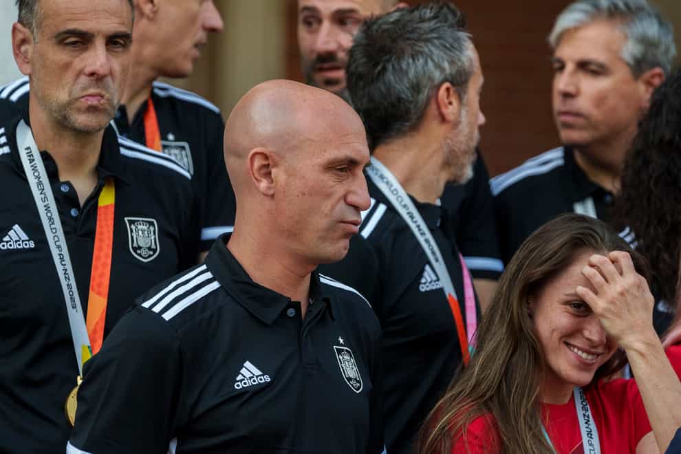 President of Spain’s soccer federation, Luis Rubiales, centre, stands with the Women’s World Cup winners at La Moncloa Palace in Madrid (AP Photo/Manu Fernandez)