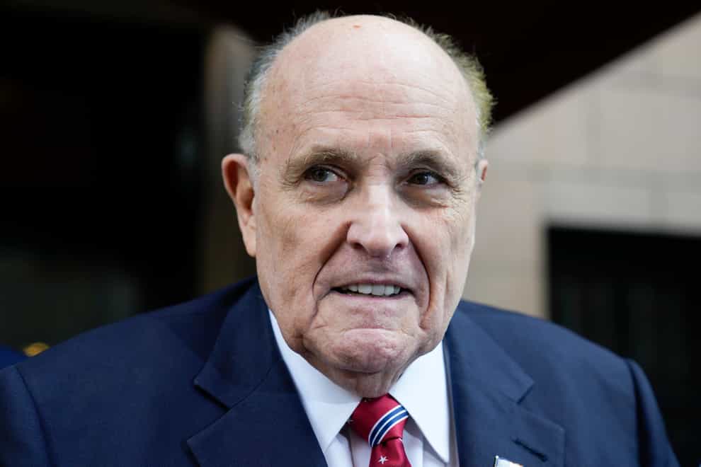 Former New York mayor Rudy Giuliani is expected to turn himself in at a jail in Atlanta on Wednesday on charges related to efforts to overturn then-president Donald Trump’s loss in the 2020 presidential election in Georgia (Seth Wenig/AP)
