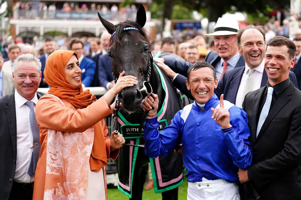 Frankie Dettori with owner Sheikha Hissa and Mostahdaf (Mike Egerton/PA)
