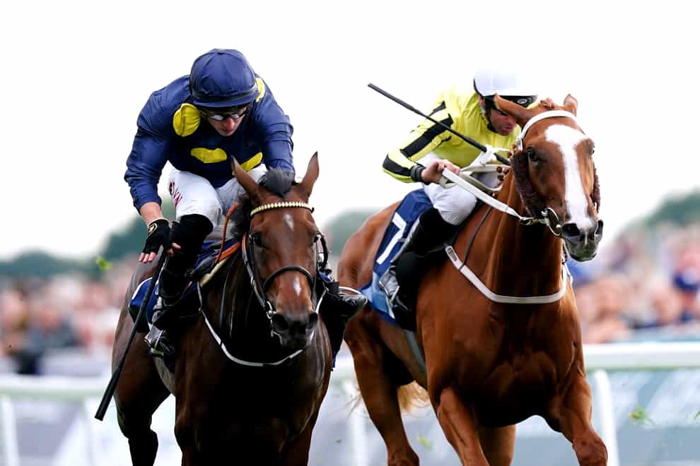 Sea Theme ridden by jockey Tom Marquand (left) on their way to winning the British EBF & Sir Henry Cecil Galtres Stakes on day two of the Sky Bet Ebor Festival at York Racecourse (Mike Egerton/PA)