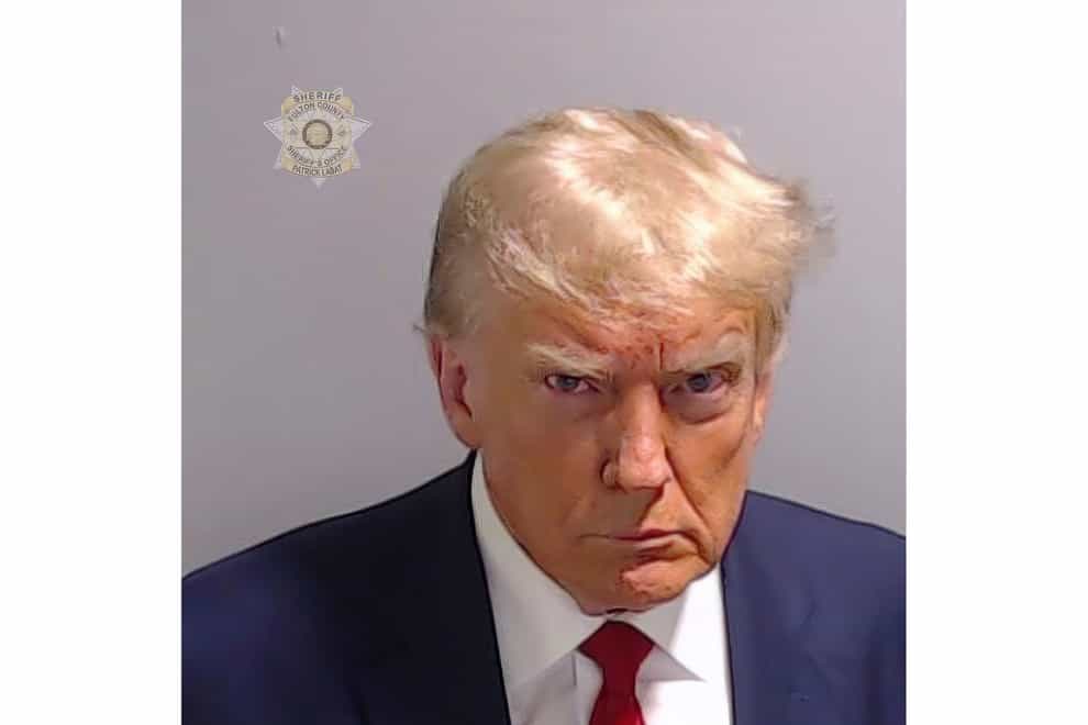 <p>Booking photo of former president Donald Trump on Thursday after he surrendered and was booked at the Fulton County Jail in Atlanta (Fulton County Sheriff’s Office via AP)</p>
