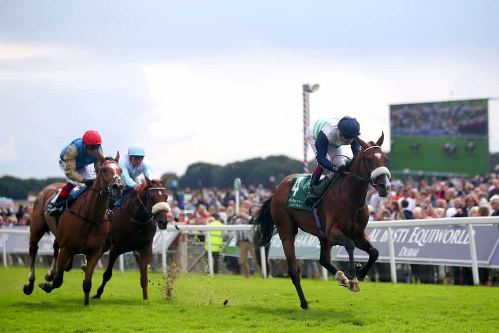 Coltrane ridden by jockey Oisin Murphy (right) on their way to winning the Weatherbys Hamilton Lonsdale Cup at York (Simon Marper/PA)
