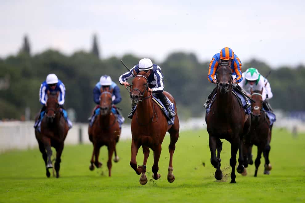 Lake Forest ridden by jockey Tom Marquand (centre) on their way to winning the Al Basti Equiworld Dubai Gimcrack Stakes (Simon Marper/PA)