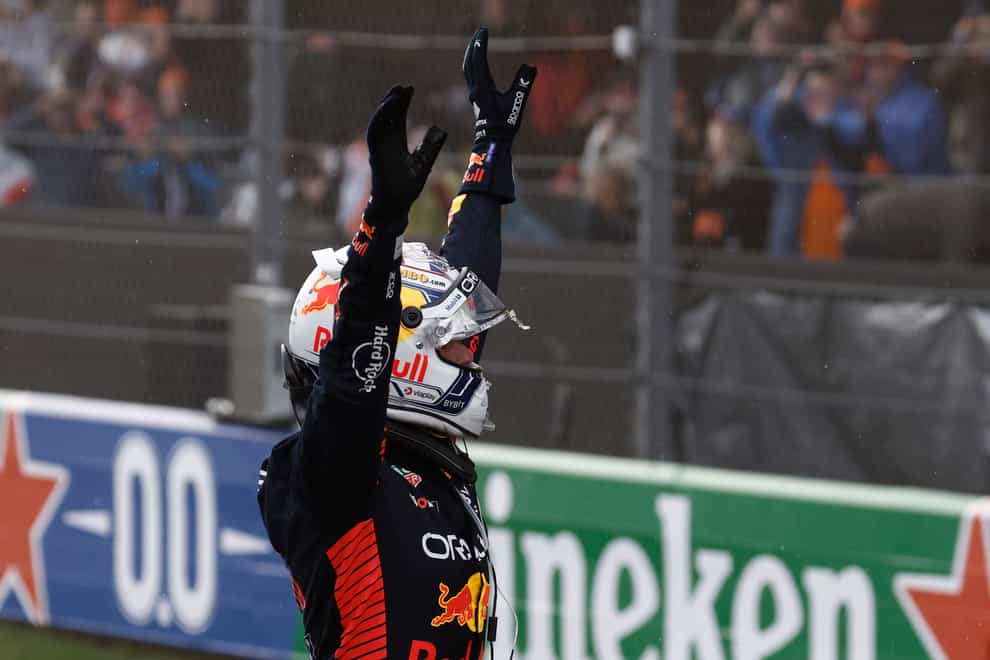 Red Bull driver Max Verstappen of the Netherlands celebrates after winning the Formula One Dutch Grand Prix , at the Zandvoort racetrack, in Zandvoort, Netherlands, Sunday, Aug. 27, 2023. (Simon Wohlfart/Pool via AP)