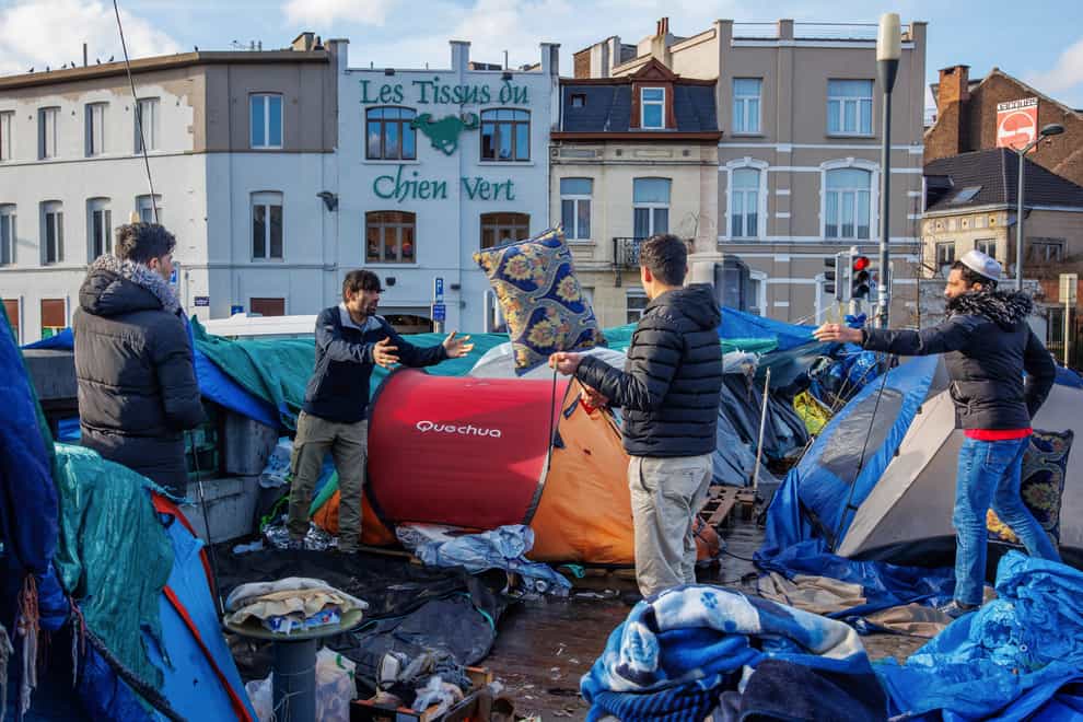 A makeshift tent camp outside the Petit Chateau reception centre in Brussels (Olivier Matthys/AP)