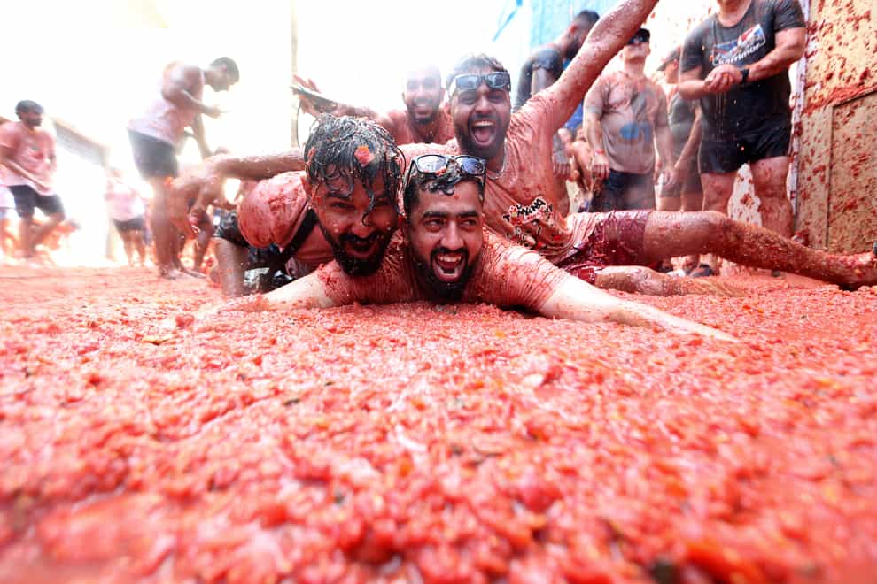The annual tomato festival Tomatina in the village of Bunol (Alberto Saiz/AP)