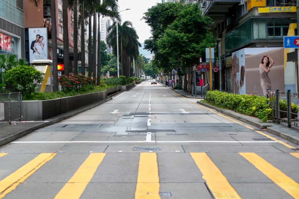 A street is deserted in Hong Kong as Super Typhoon Saola approaches the city (Daniel Ceng/AP)