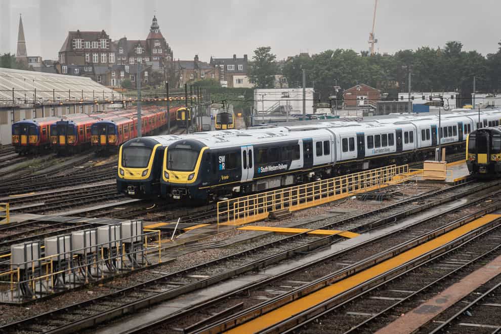 Trains parked up on tracks at Clapham Junction Station, south-west London during industrial action (Aaron Chown/PA)