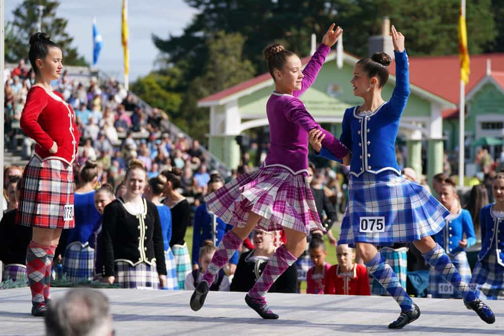 Highland dancers during competition at the Braemar Gathering (Andrew Milligan/PA)