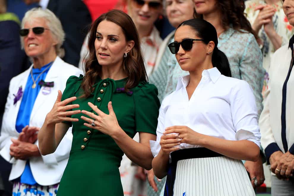 Kate and Meghan at Wimbledon in 2019 (Adam Davy/PA)
