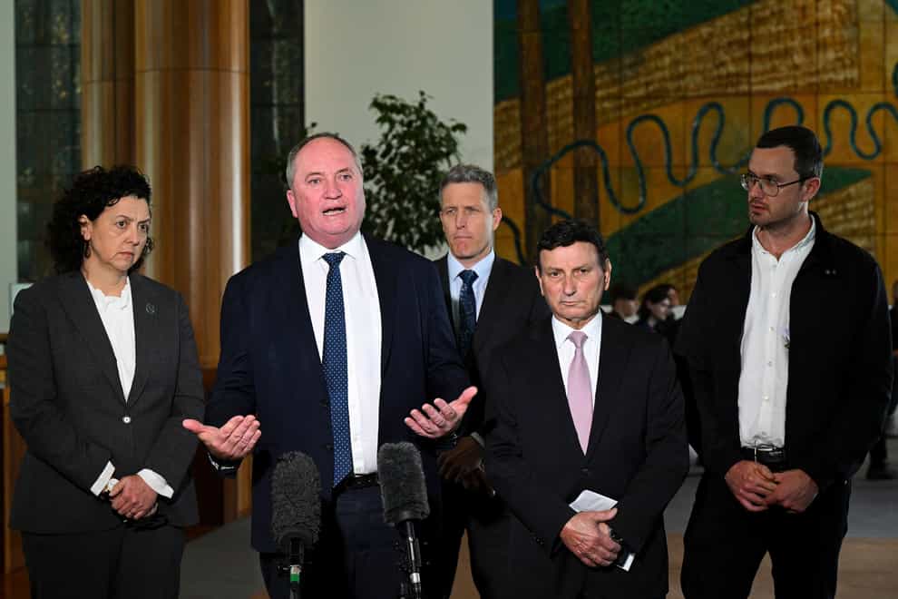 Barnaby Joyce, second left, and other members of a delegation to secure the release of WikiLeaks founder Julian Assange (Lukas Coch/(AAP Image via AP)