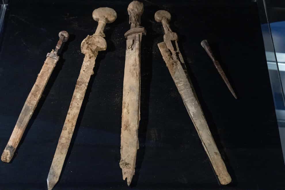 The four Roman-era swords and a javelin head were found during a recent excavation (Ohad Zwigenberg/AP)