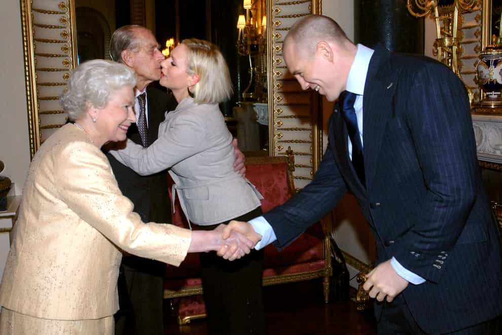 The Queen greets Mike Tindall at Buckingham Palace in 2006 (Stefan Rousseau/PA)