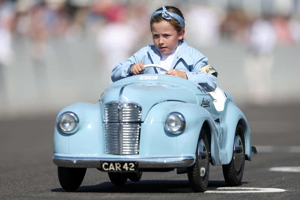 A young racer competes in the Settrington Cup at the Goodwood Revival (Kieran Cleeves/PA)
