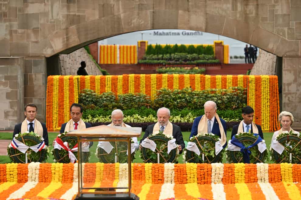 G20 leaders paid their respects at a memorial site dedicated to Indian independence leader Mahatma Gandhi on Sunday (Kenny Holston/Pool/AP)
