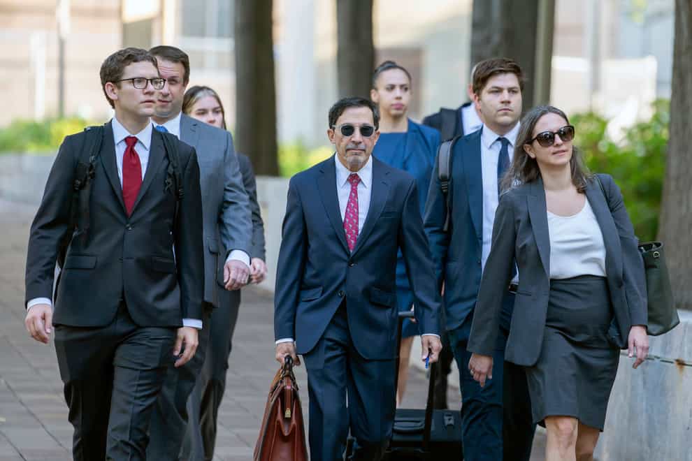 US Department of Justice lawyers arrive at court (Nathan Howard/AP)