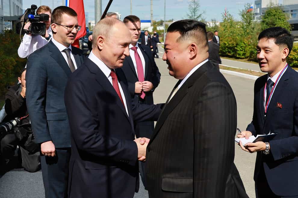 Vladimir Putin (left) and Kim Jong Un shake hands during their meeting at the Vostochny cosmodrome outside the city of Tsiolkovsky (Vladimir Smirnov, Sputnik, Kremlin Pool Photo via AP/PA)