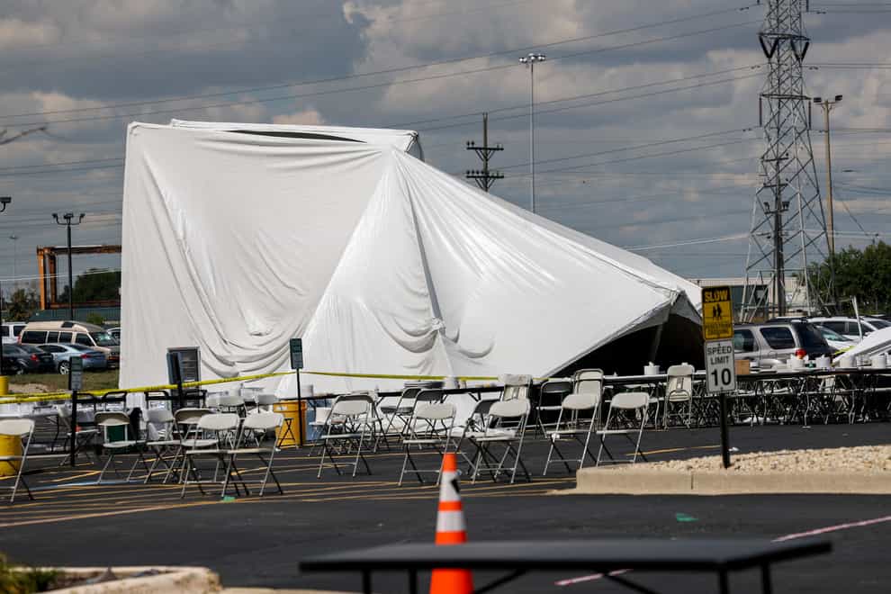 A collapsed tent in a car park in Bedford Park, Chicago (Armando L Sanchez/Chicago Tribune via AP)