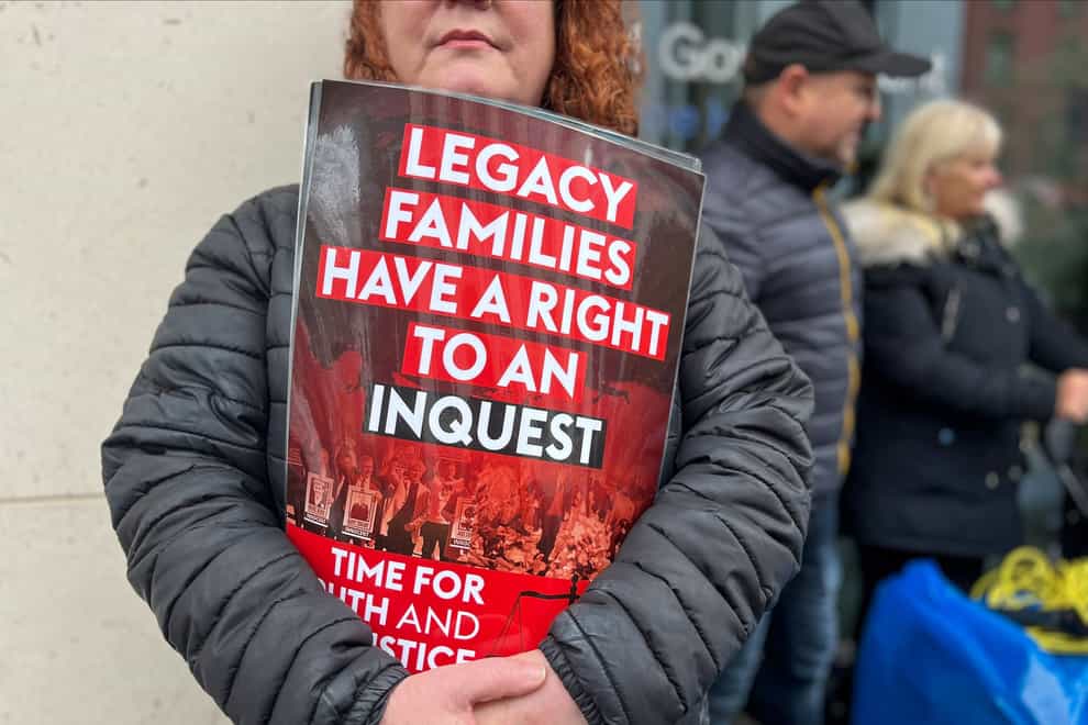 Time for Truth and Justice campaigners protest against the Northern Ireland Troubles (Legacy and Reconciliation) Bill outside the Northern Ireland Office at Erskine House in Belfast (PA)