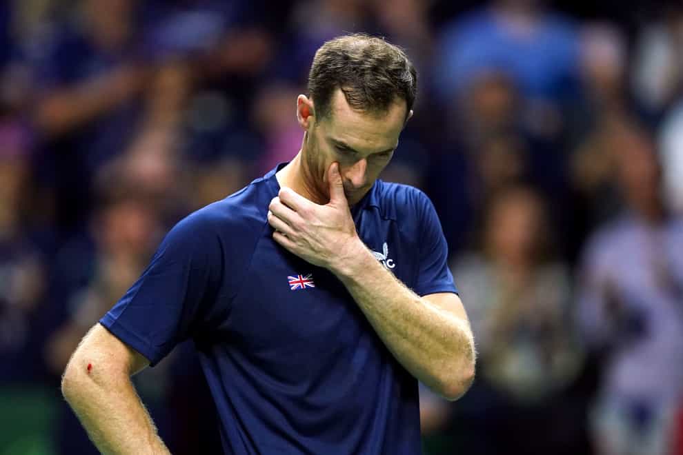 Andy Murray wipes away tears during his on-court interview (Martin Rickett/PA)