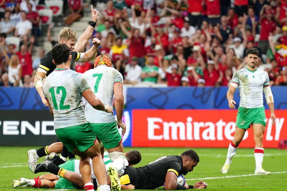 Wales’ Taulupe Faletau scores their fourth try against Portugal (Mike Egerton/PA).
