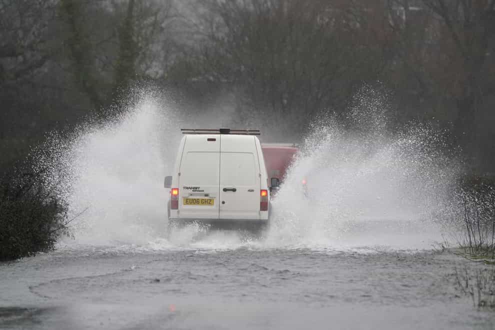 Areas affected by the amber warning are likely to be flooded and people should expect some disruption to travel (Andrew Matthews/PA)