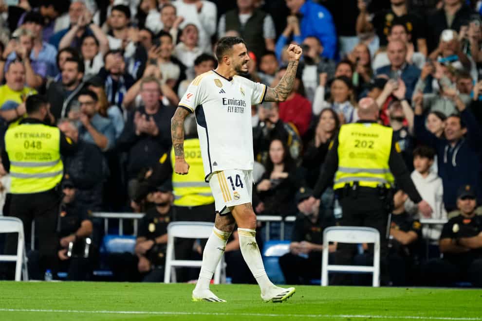 Joselu celebrates after scoring in Real Madrid’s 2-1 win over Real Sociedad (Jose Breton/AP)