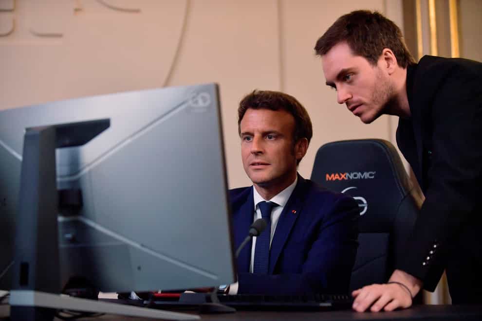Emmanuel Macron is extending an olive branch to video gamers after previously linking video games to riots that rocked France this year (Julien de Rosa/AP)