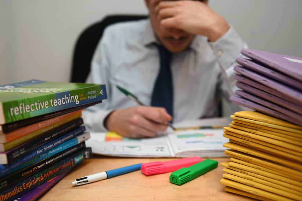 The NASUWT has instructed its members to take action short of a strike over what it said was teachers’ ‘excessive’ workloads (PA)