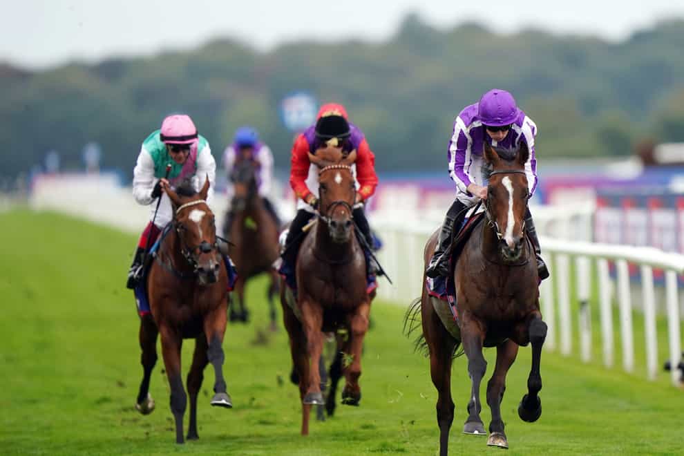 Continuous (right) winning the St Leger at Doncaster (Tim Goode/PA)