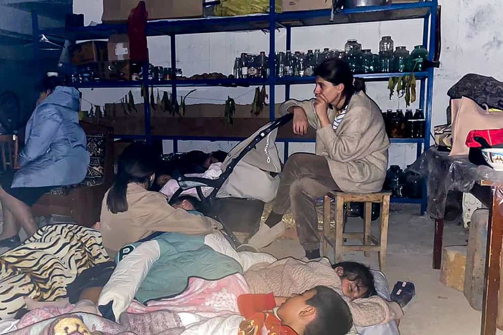 Children sleep in a shelter during shelling in Stepanakert in Nagorno-Karabakh (Siranush Sargsyan/AP)