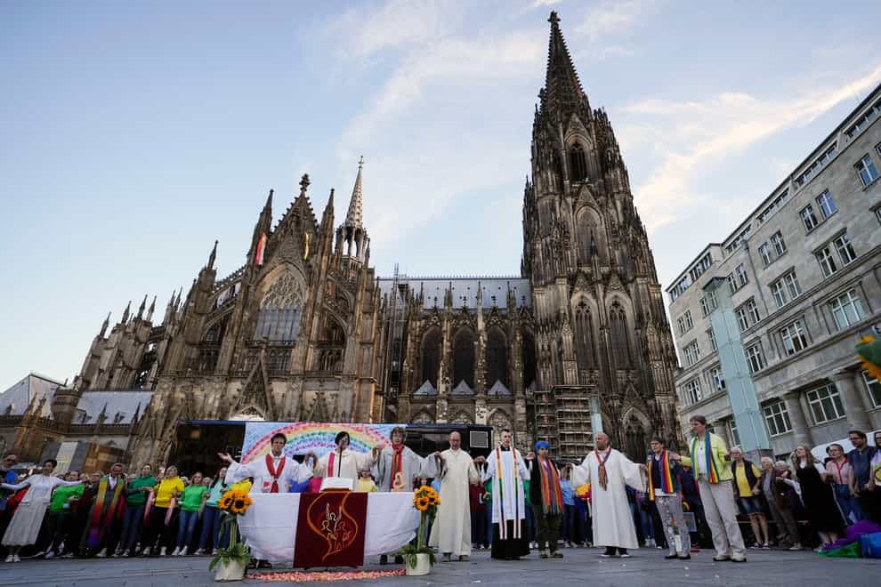 A public blessing ceremony with hundreds of believers takes place at Cologne Cathedral in Germany (Martin Meissner/AP/PA)