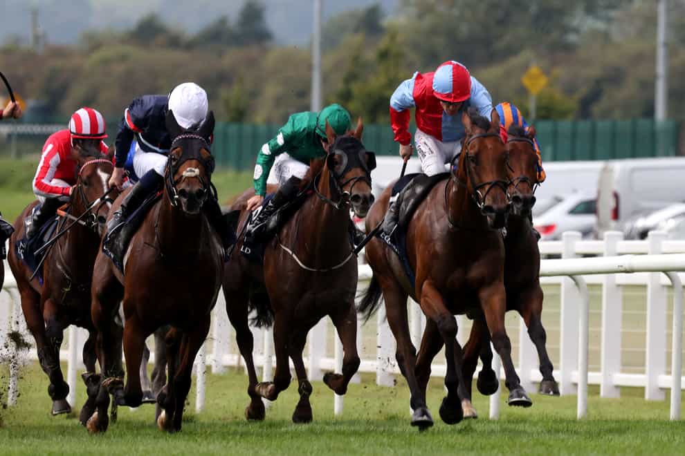 Moss Tucker (second right) winning the Flying Five Stakes at the Curragh (Damien Eagers/PA)