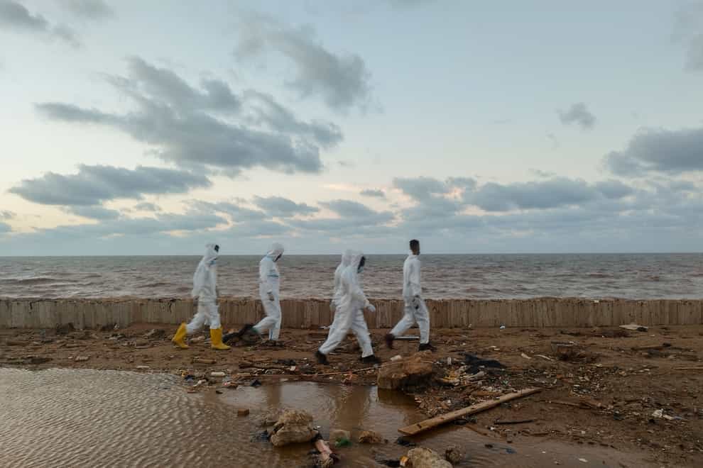 Rescuers search for bodies of flood victims at the Corniche of the city of Derna (Abdulaziz Almnsori/AP)