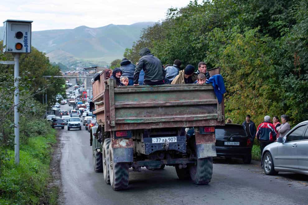 Ethnic Armenians have been leaving Nagorno-Karabakh (Gaiane Yenokian/AP)