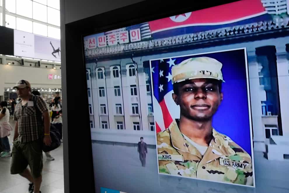 A TV screen in South Korea shows an image of American soldier Travis King (Ahn Young-joon/AP)