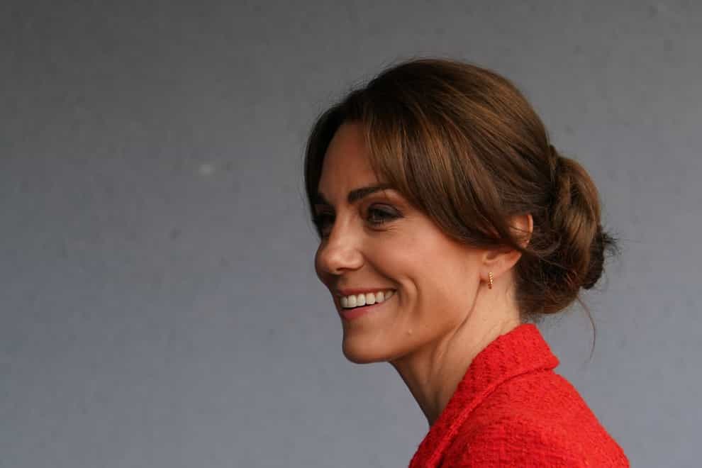 Kate wore her glossy locks in a twisted braid style (Gareth Fuller/PA)