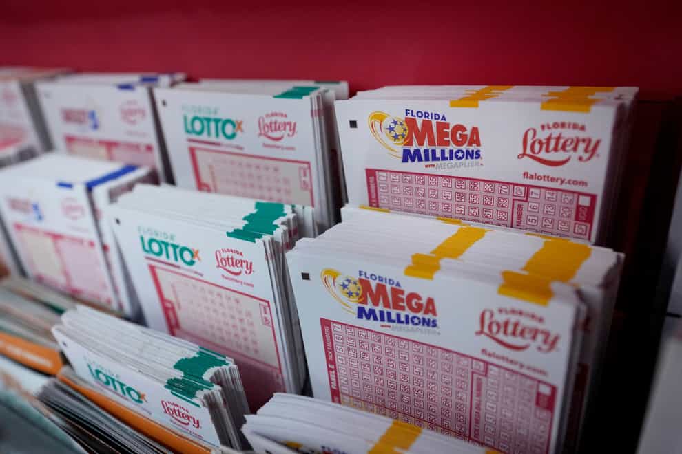 The winner of the 1.6 billion dollar (£1.32 billion) Mega Millions jackpot in August — the third-largest in US history — has come forward to claim the prize, officials have said (Wilfredo Lee/AP)